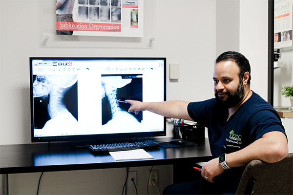 Chiropractor Plano TX Cyrus Laali Reading X-rays