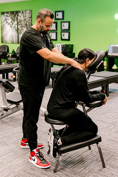 Chiropractor Cyrus Laali Adjusting Patients Neck